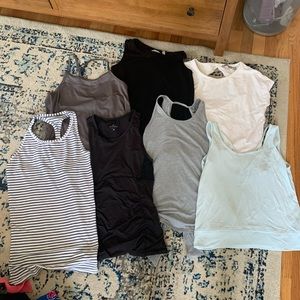 Bundle of 7 Athleta tank tops. Size XS